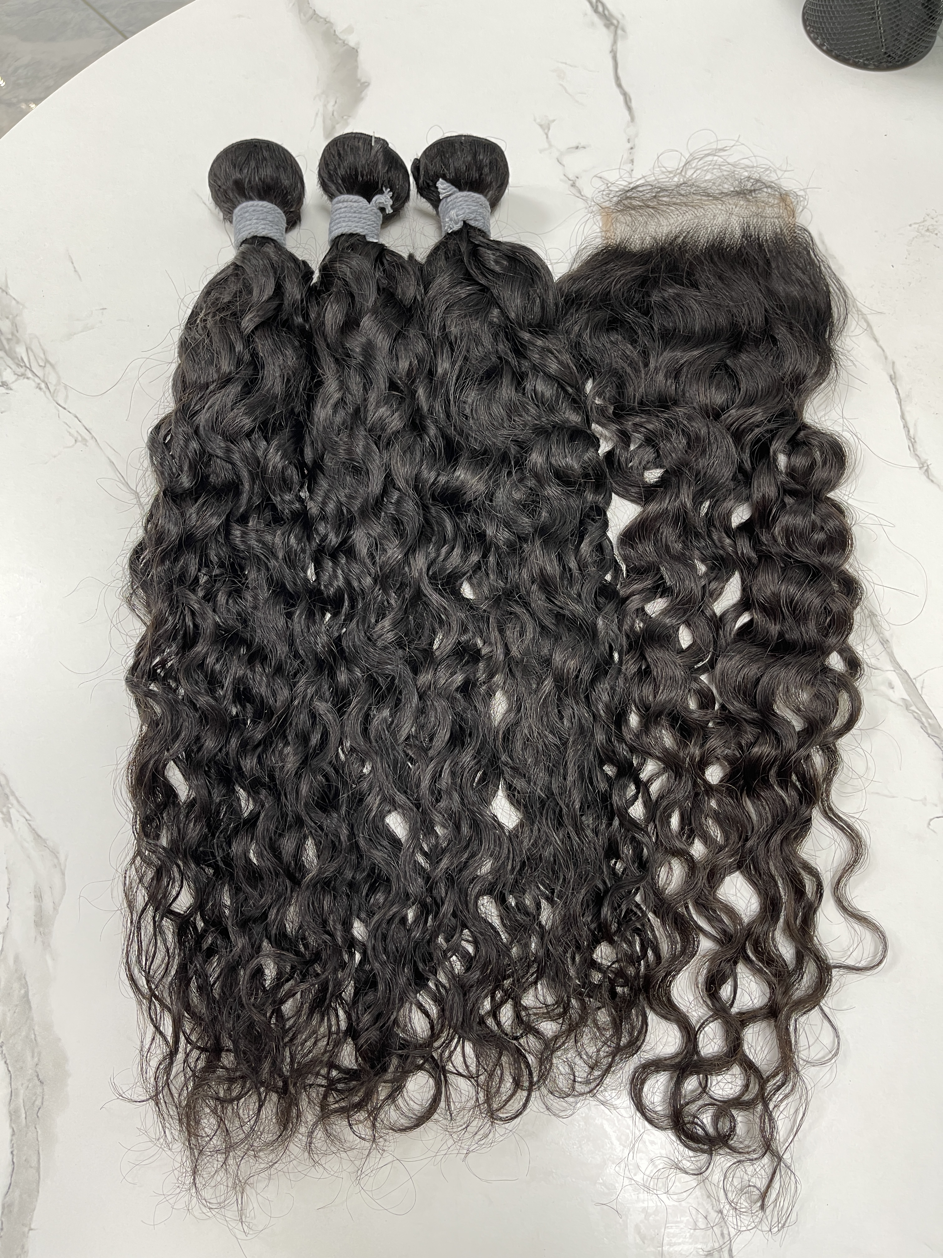 Angelbella vague d'eau dentelle fermeture avec paquets brésiliens vierges cheveux humains faisceaux